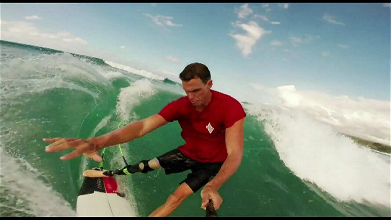 Disabled surfer Mike Coots returns to waves. SBS