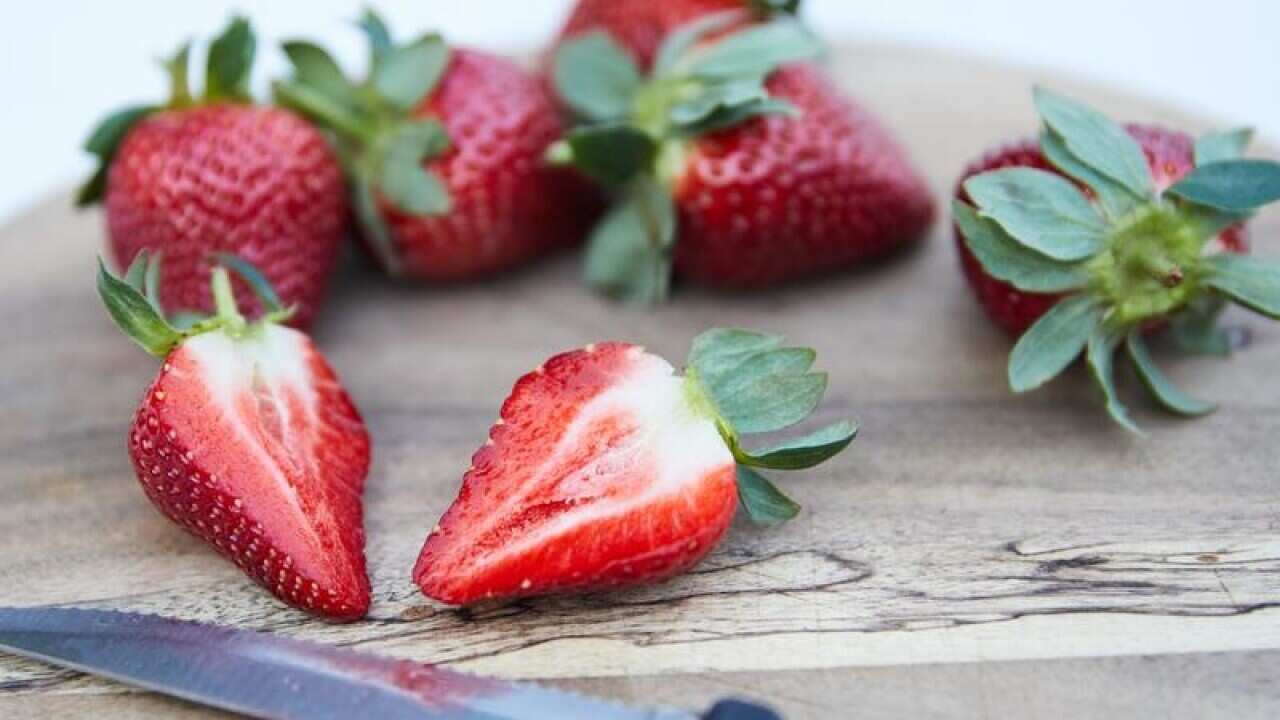 Australian authorities have been alerted to the discovery of a contaminated strawberry punnet in NZ.