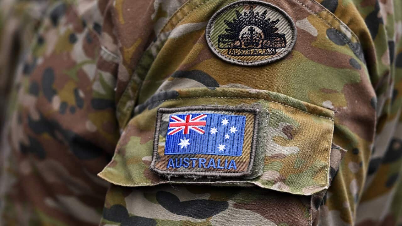 Australian flag logo on a military uniform.