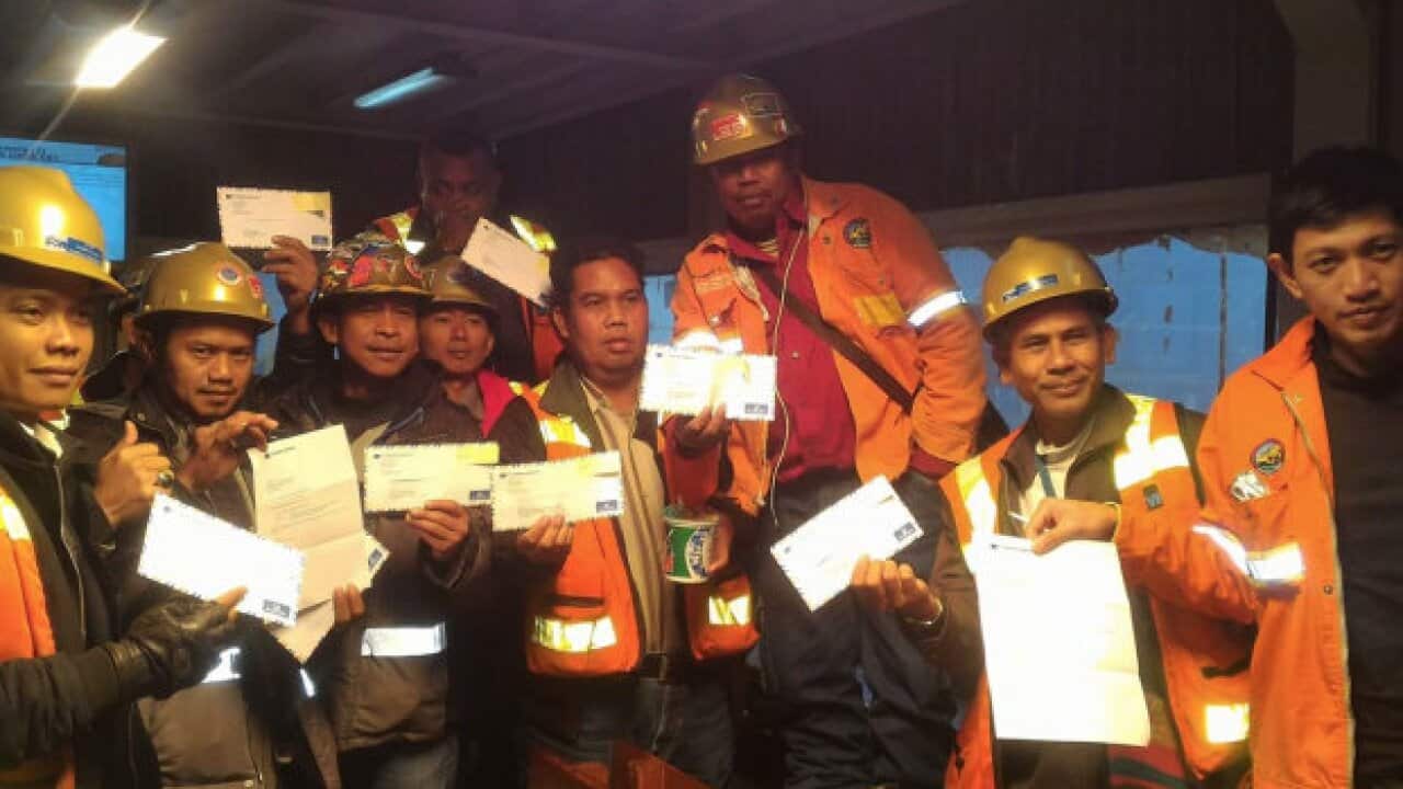 Freeport workers with Furlough letters, 10 May 2017.