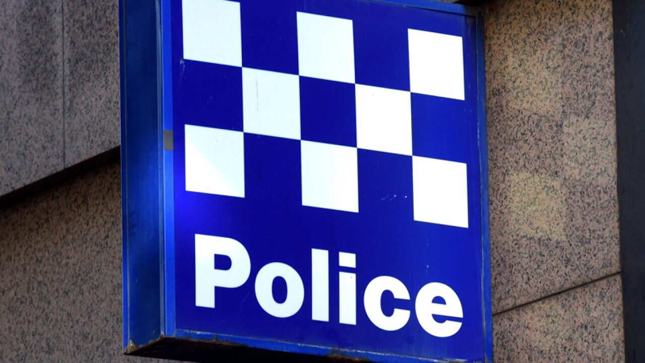 A police station sign