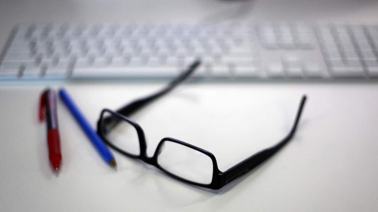 Senior Citizens' Reading glasse, pen and computer