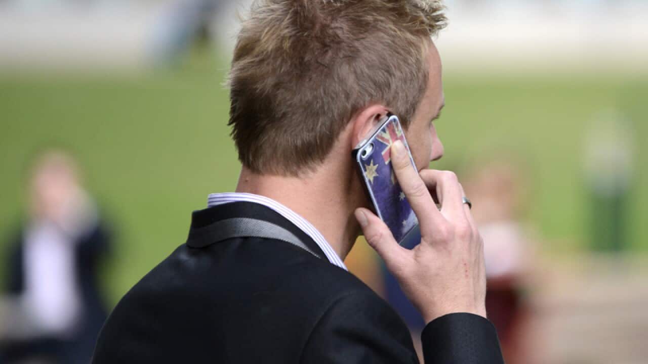 A man uses a smartphone