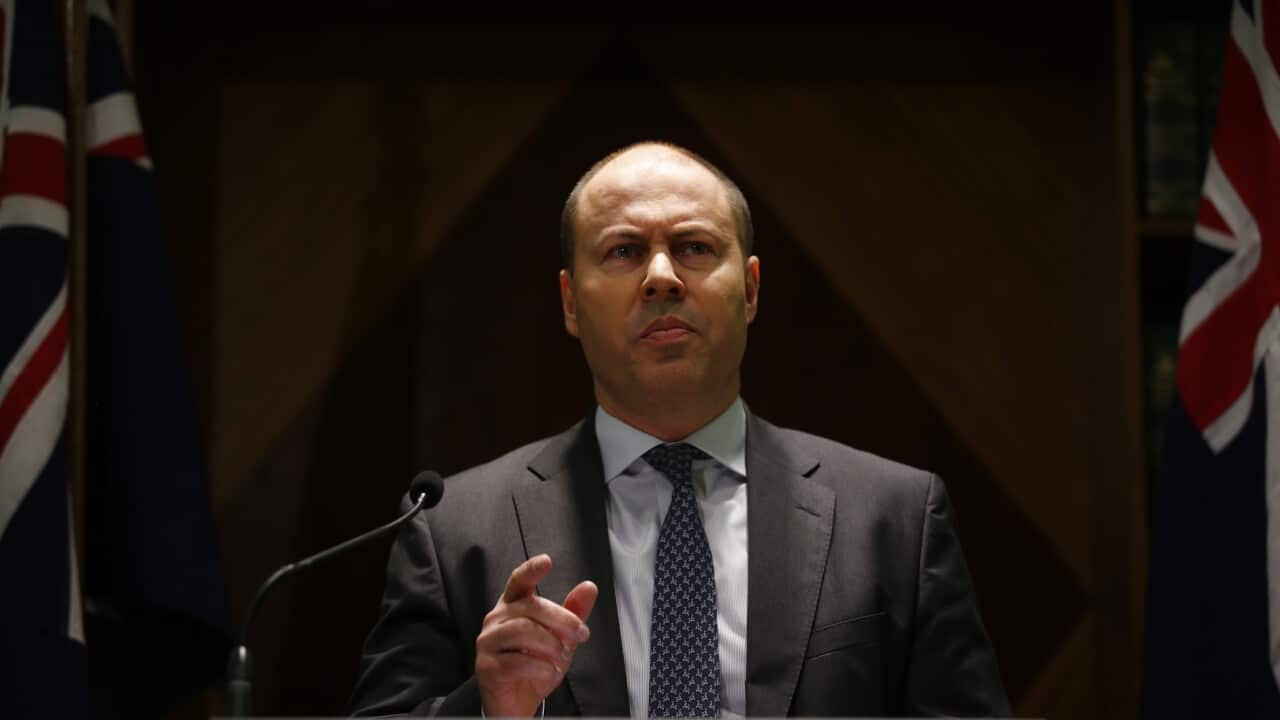 Treasurer Josh Frydenberg speaks to the media during an announcement in Melbourne, Friday, July 31, 2020. (AAP Image/Daniel Pockett) NO ARCHIVING