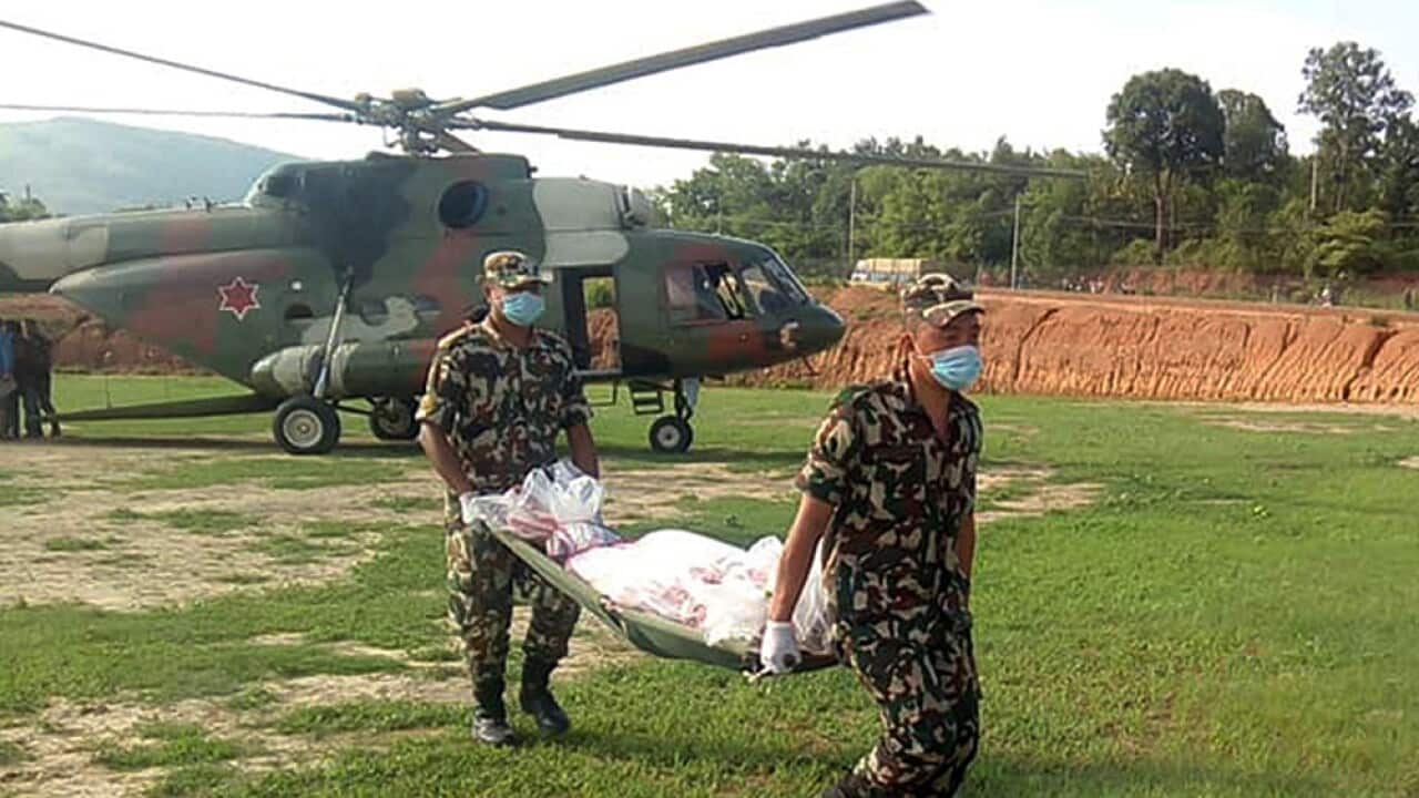 Mustang tipper accident victim's body brought by military helicopter.