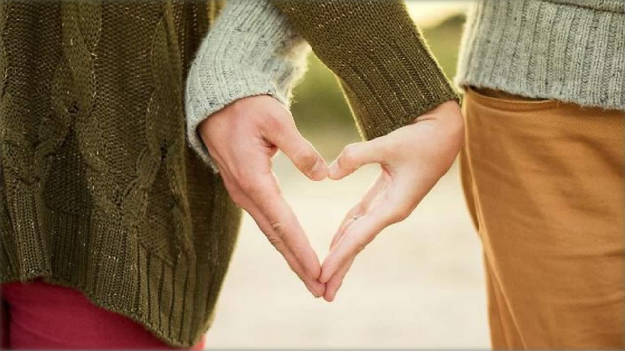 couple holding hands