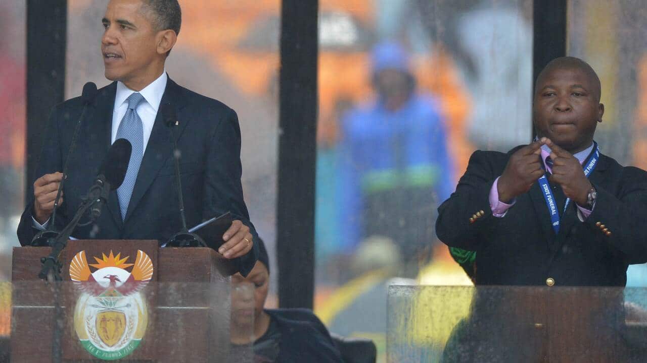 US President Barack Obama next to a sign language interpreter aap.jpg