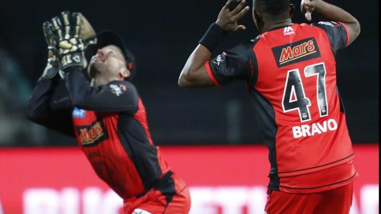 Tim Ludeman and Dwayne Bravo of the Renegades.