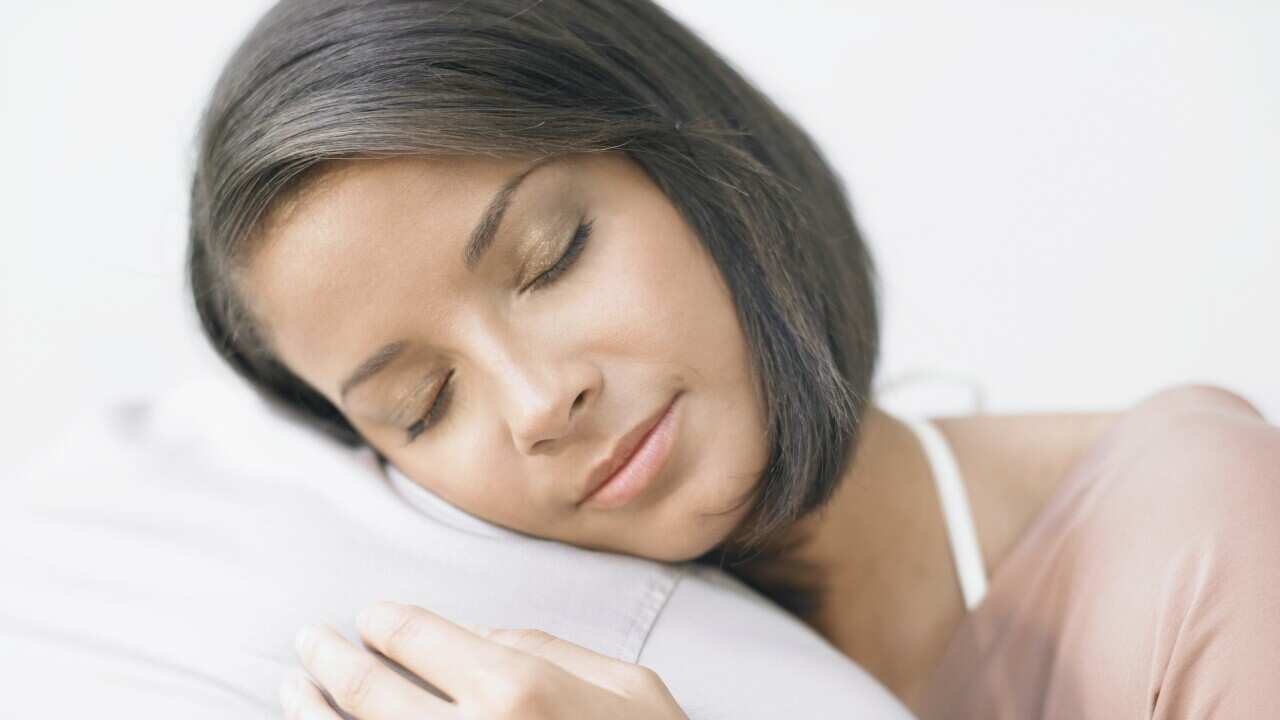 Young Brunette Woman Sleeping