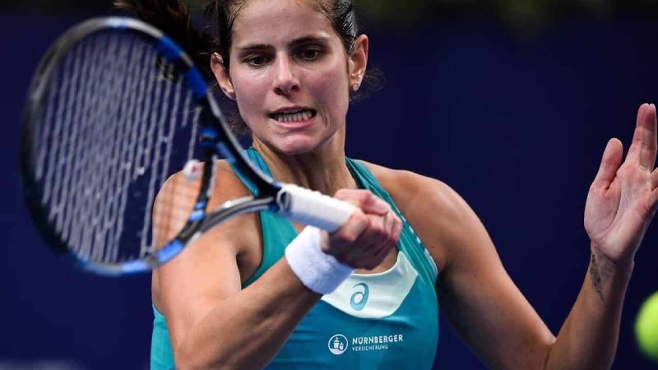 Julia Goerges of Germany returns a shot