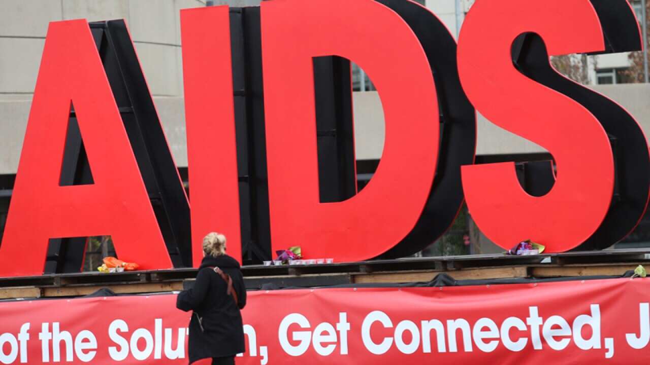 A large sign in Melbourne for the AIDS conference