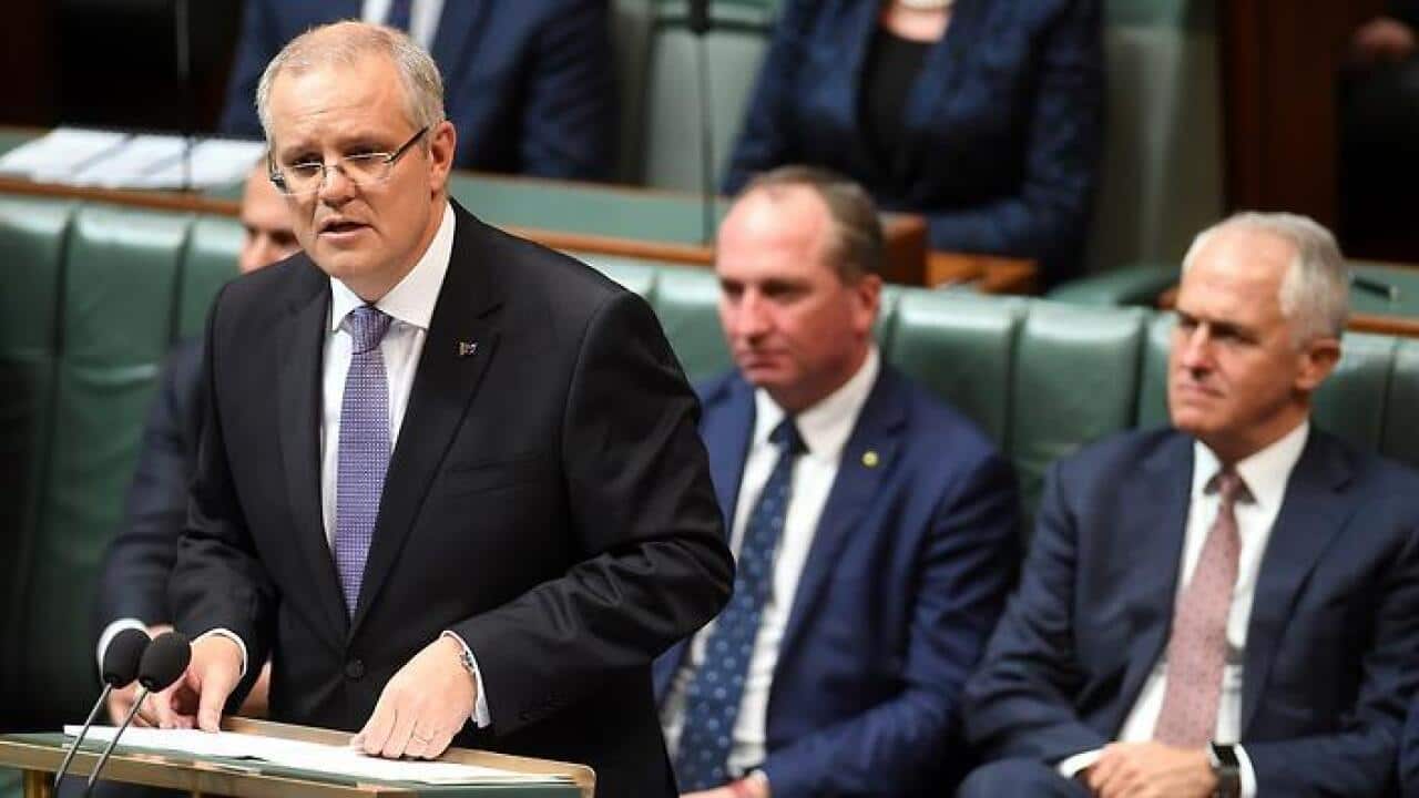 Australian Federal Treasurer Scott Morrison speaks at the dispatch box during the delivery of the 2017-18 Federal Budget in the House of Representatives at Parliament House in Canberra, Tuesday, May 9, 2017. (AAP Image/Lukas Coch) NO ARCHIVING