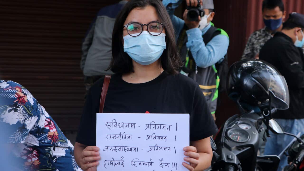 Nepalis protesting against the dissolution of parliament.