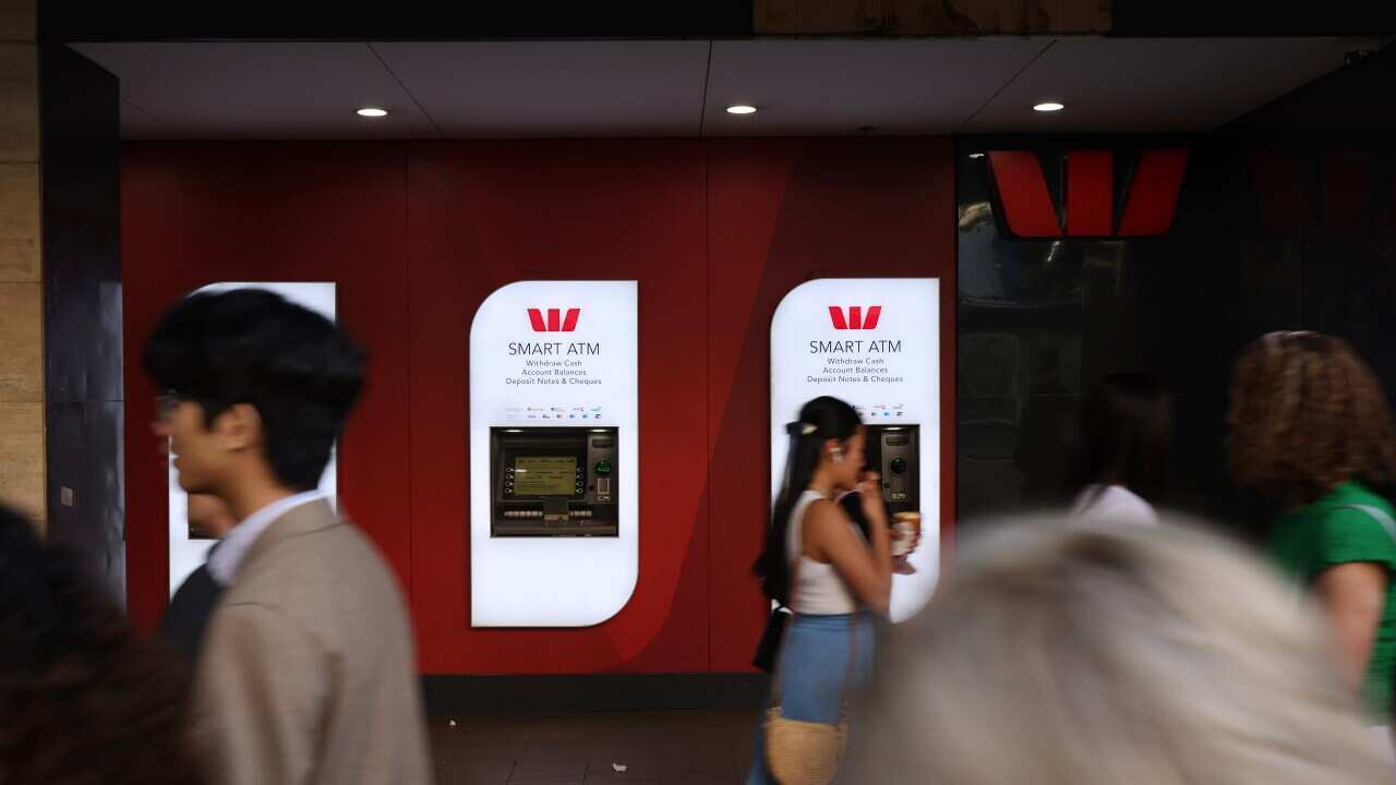People walk past Westpac ATMs in Melbourne