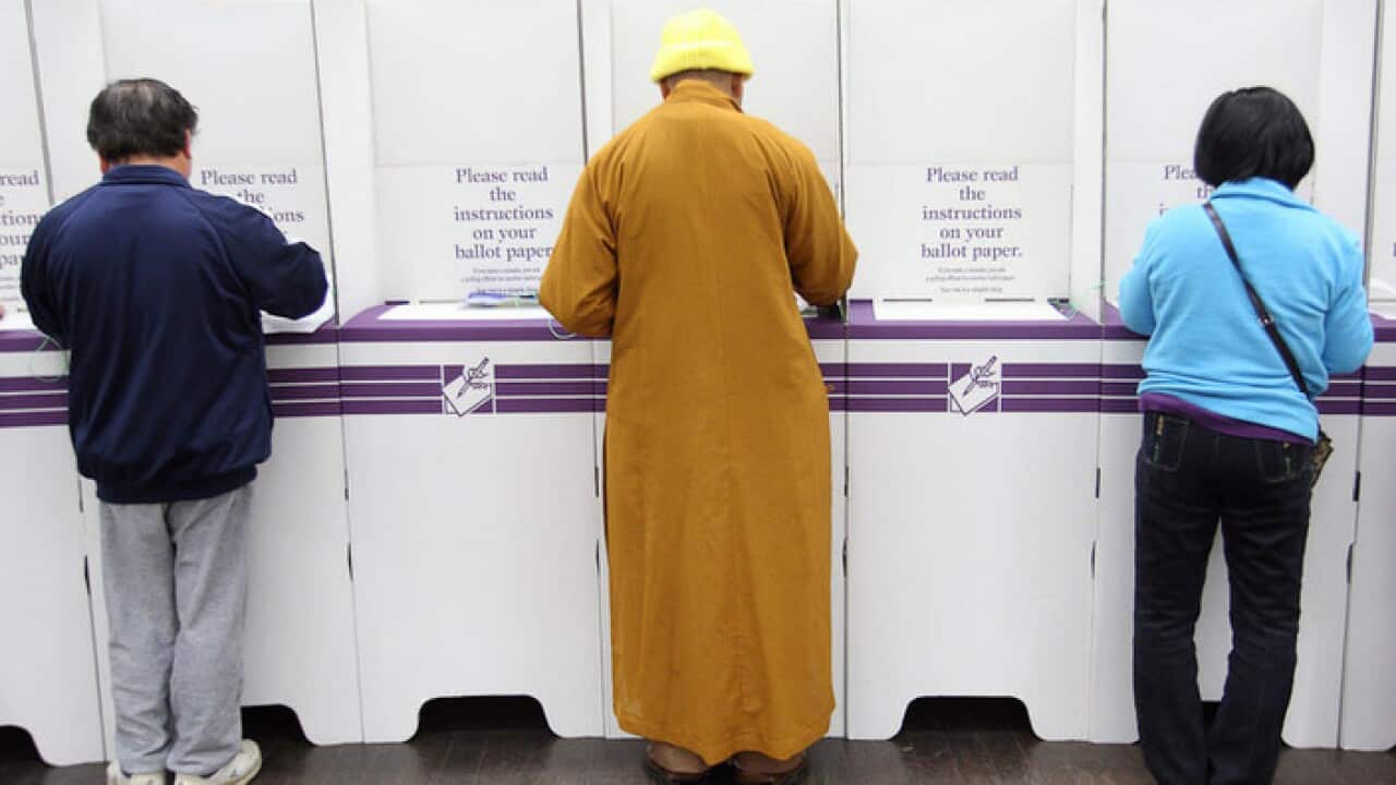 Watu wapiga kura katika mbinu yakitamaduni