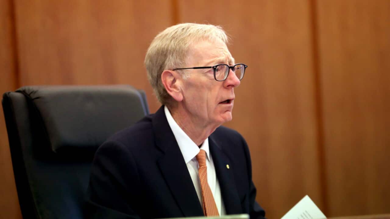 Commissioner Kenneth Hayne makes his opening comments