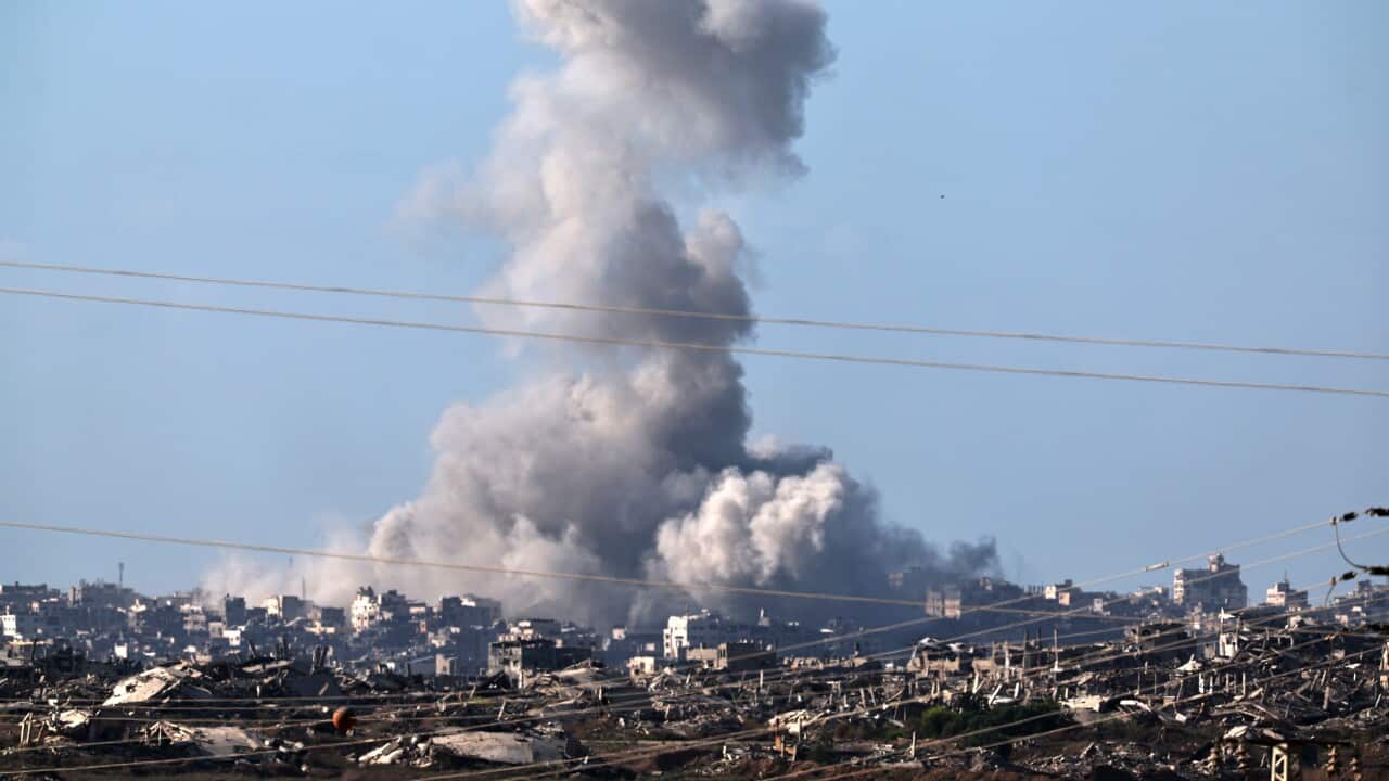 Smoke rises after an Israeli airstrike on the outskirts of Gaza City, as seen from an undisclosed location on the Israeli side of the border, 16 September 2025.