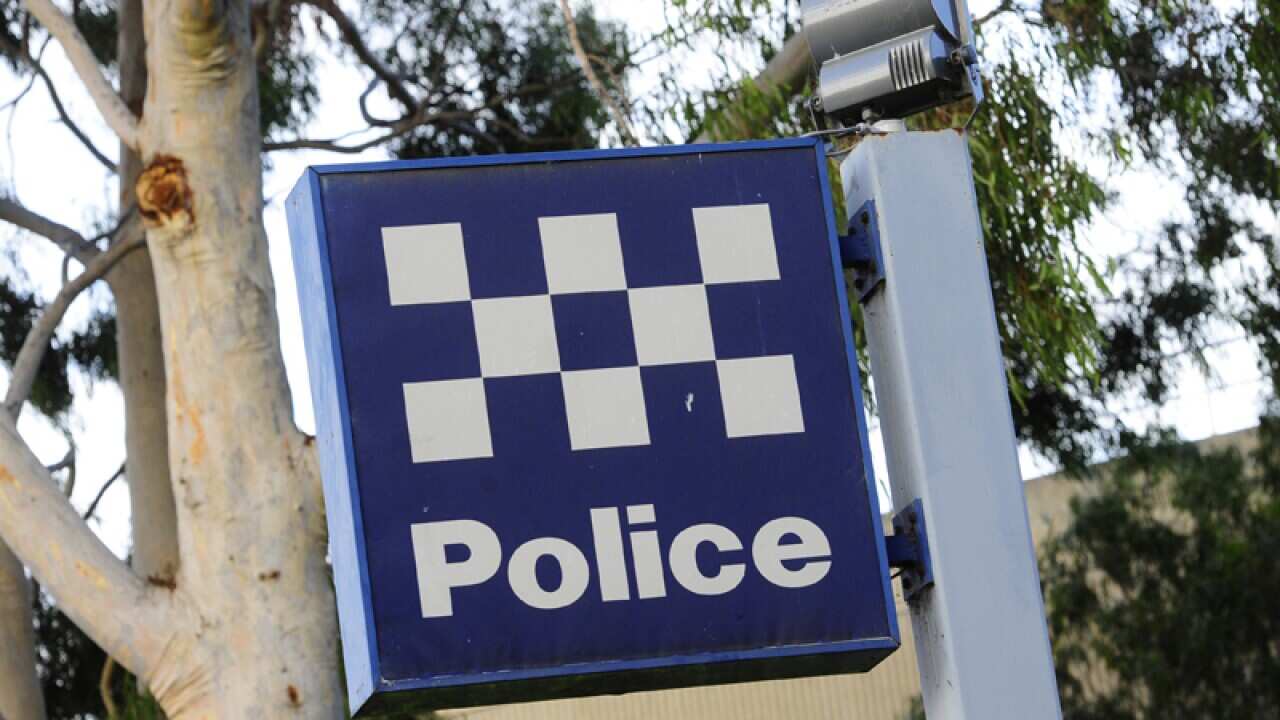 A police station sign