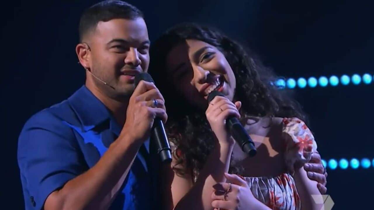 Alicia George with Guy Sebastian during an audition for "The Voice".