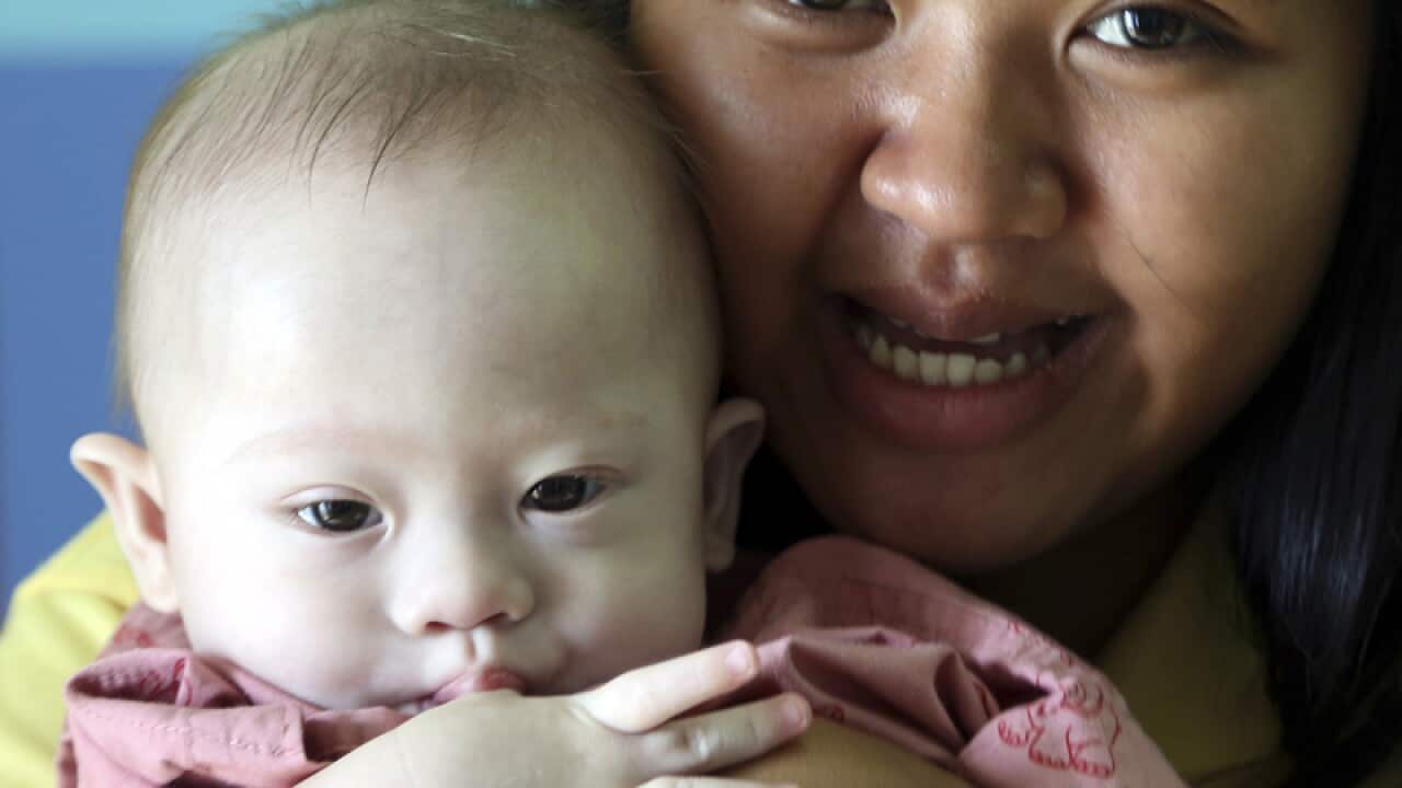 Thai surrogate mother Pattaramon Chanbua and baby Gammy.