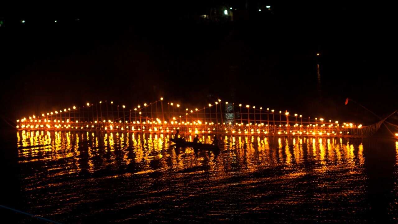 Light boat in Pakse, Lao (John S Lander - LightRocket via Getty)