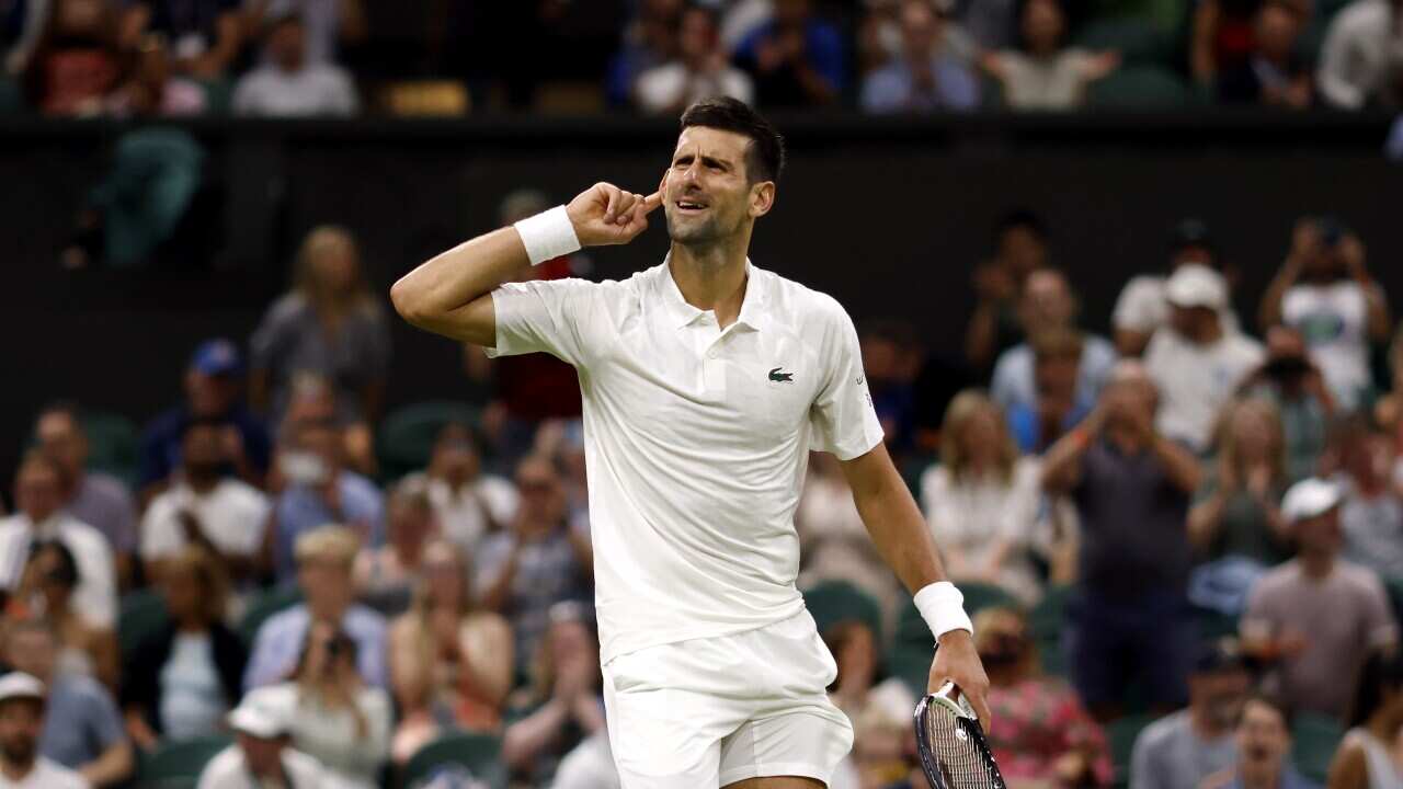 Novak Djokovic celebrates beating Stan Wawrinka on day five of the 2023 Wimbledon Championships