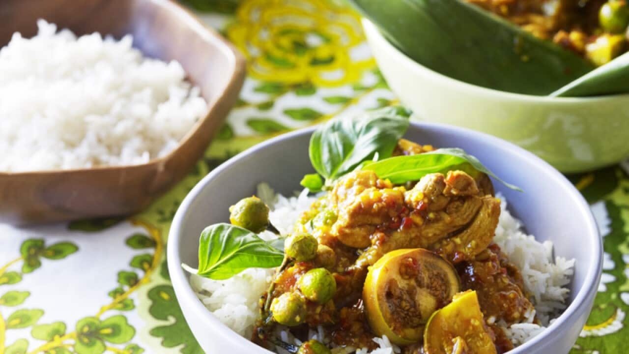 Chicken and eggplant yellow curry in banana leaf parcels SBS Food