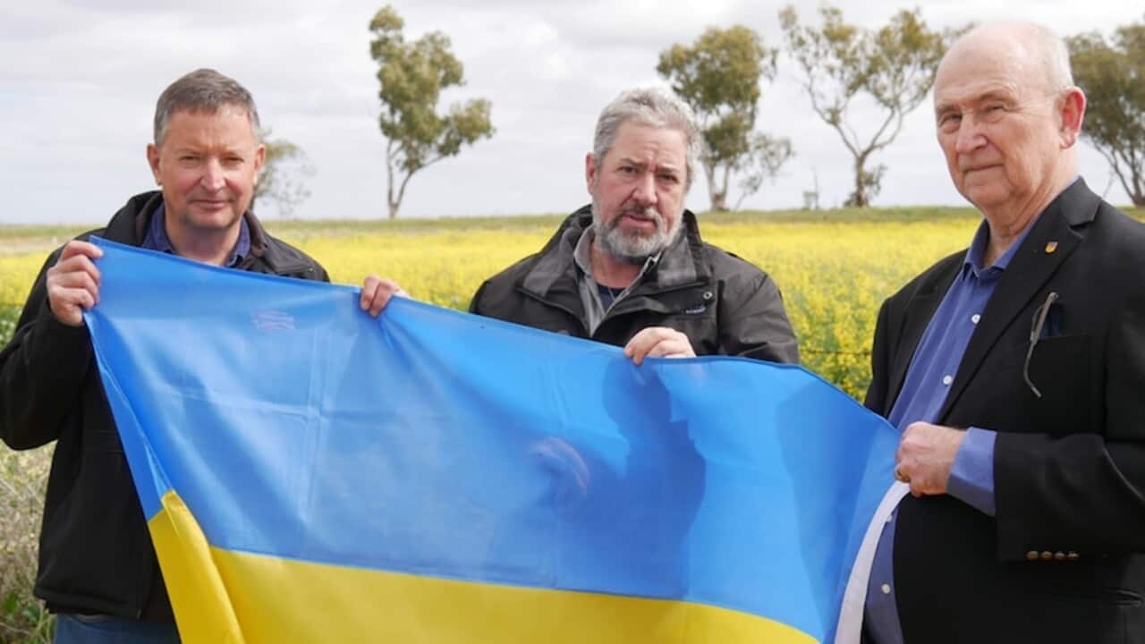 Guy Sims and Derwin Melbin with Ukrainian Association of WA president Mykola Mowczan. (ABC Midwest and Wheatbelt Bridget Herrmann).jpg
