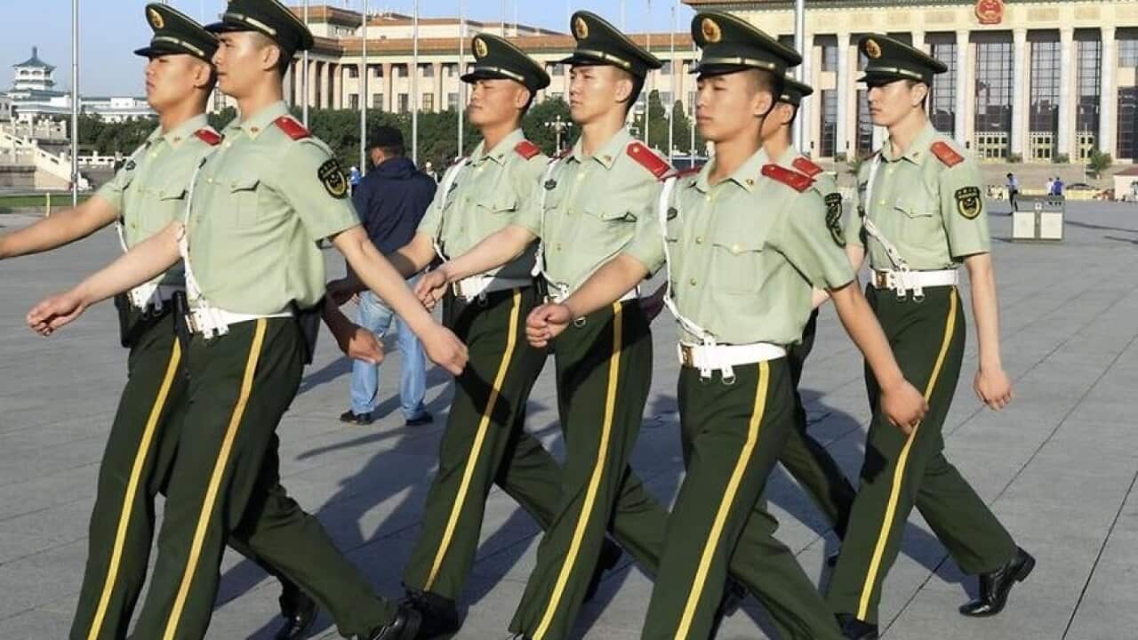 Chinese Police Patrolling Tiananmen Square