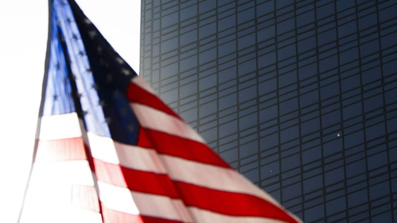 A US flag flies in front of Trump Tower in New York