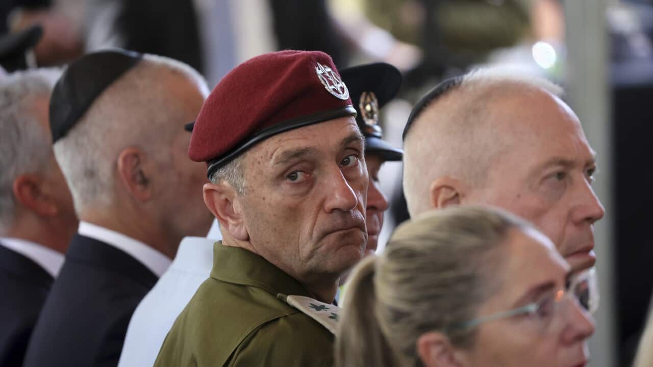 Lieutenant-General Herzi Halevi (centre) has stood down as army chief