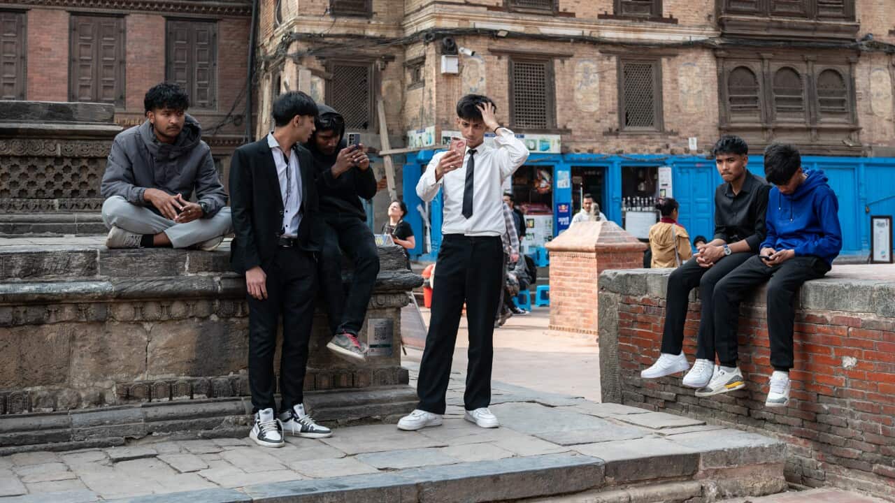 A representative image of Nepali youth, photographed at Patan Durbar Square, Nepal.