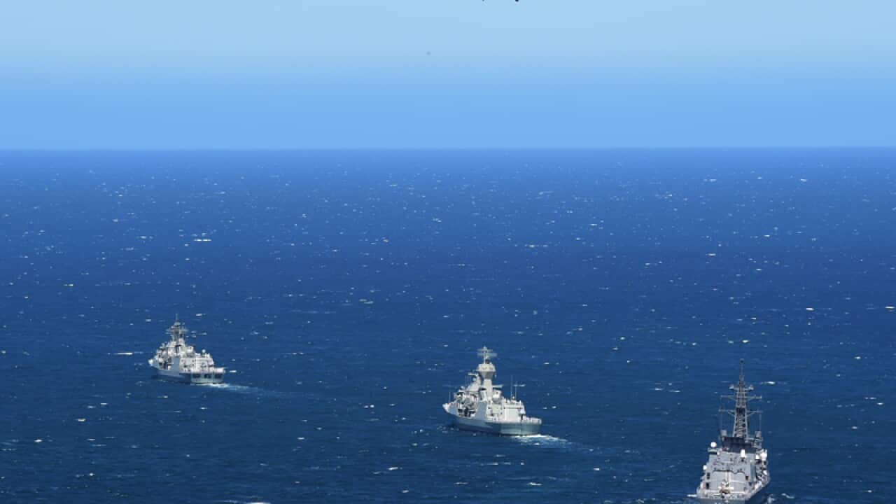 Navy ships pass through Albany.