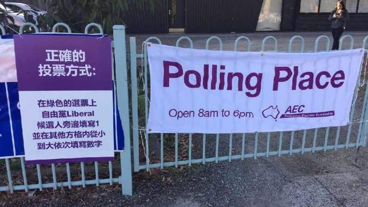 The AEC says Liberal posters in Chinese at polling booths in Melbourne have not broken any laws.