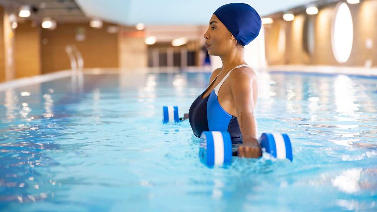 Woman recovering from an injury doing hydrotherapy