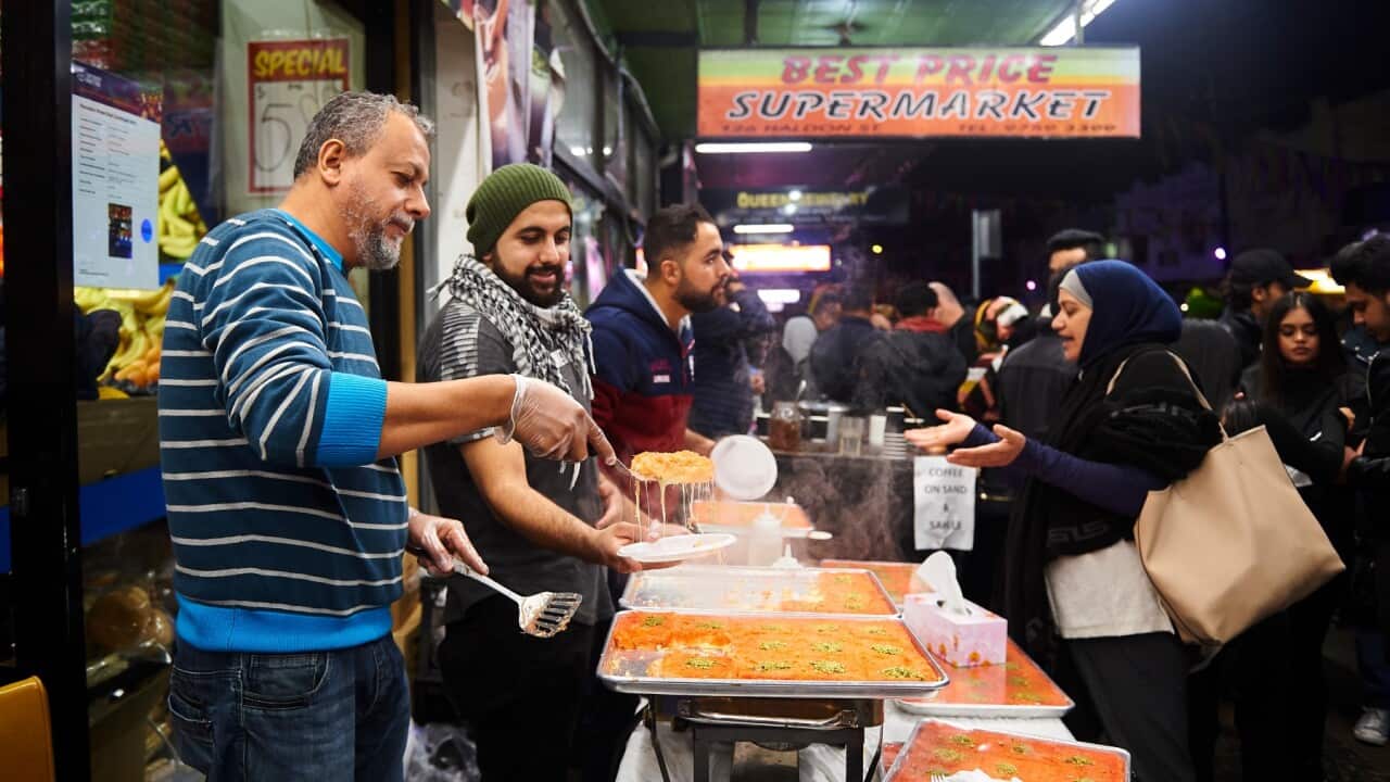 People attend a street fair at night for Ifrar, or breaking the day's fast, during Ramadan in the suburb of Lakemba on June 01, 2019 in Sydney, Australia.