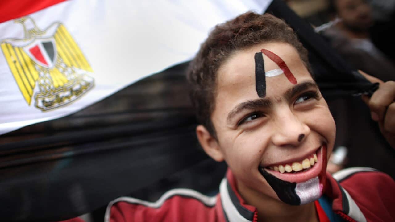 Egypt_boy_flag_111128_B_getty_514567257