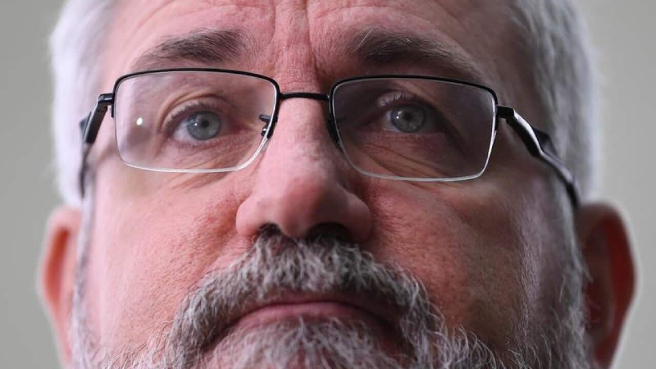 Greens Senator Andrew Bartlett speaks to the media in Canberra.