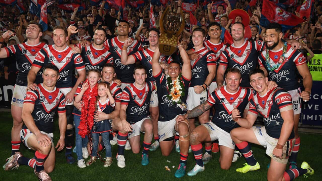 Sydney Roosters players celebrate after winning the 2019 NRL Grand Final