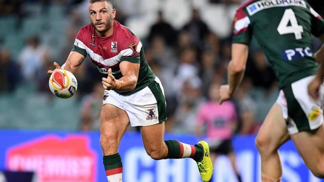 Robbie Farah of Lebanon passes the ball