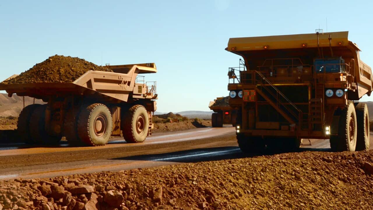 Trucks at the Rio Tinto iron ore mine in the Pilbara.