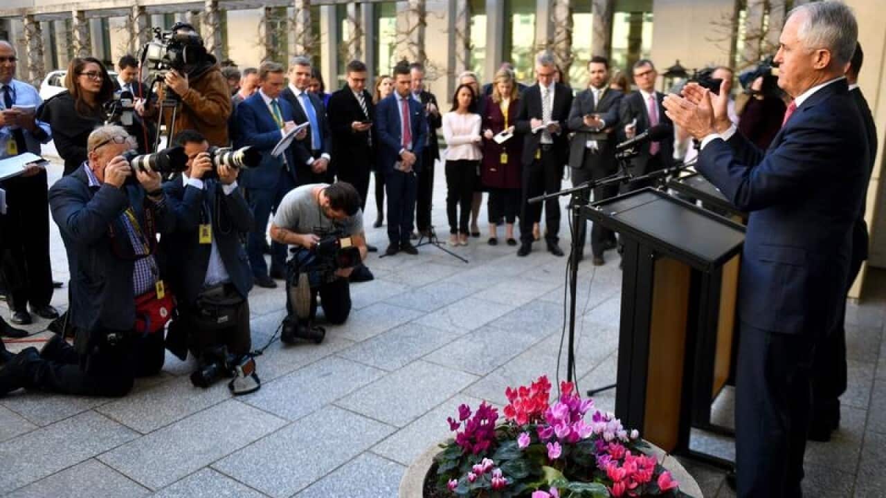 Malcolm Turnbull addresses a large press conference on energy.