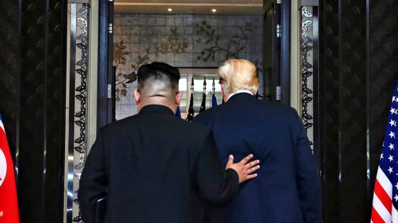 US President Donald J. Trump(R) North Korean Chairmain Kim Jong-un(L) depart after a signing ceremony during their historic DPRK-US summit, Singapore,12 June 18