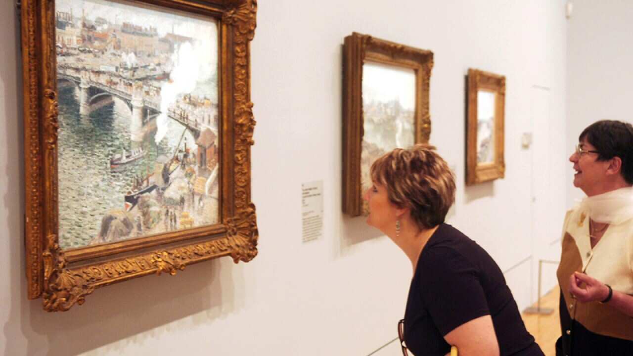 Art critics get an early look at a new exhibition by Camille Pissarro