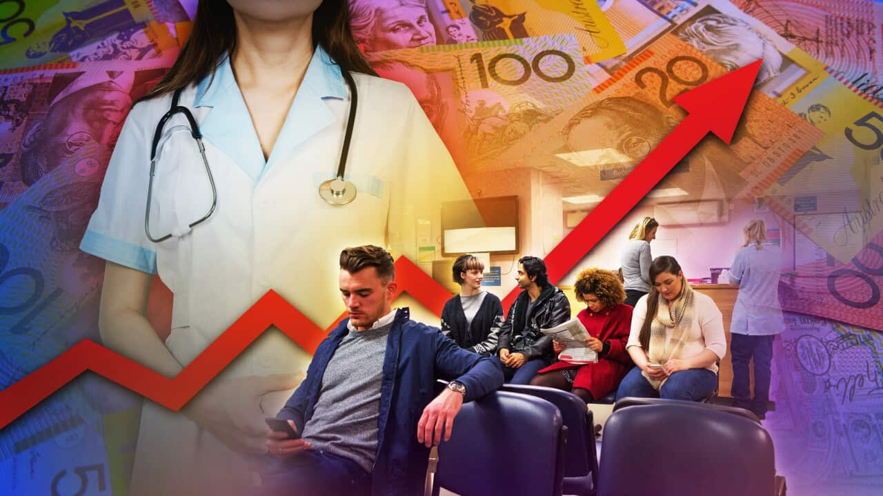 People wait in seats at a health clinic in front of a graphic showing a red arrow pointing upwards, a female doctor with a stethoscope and Australian money