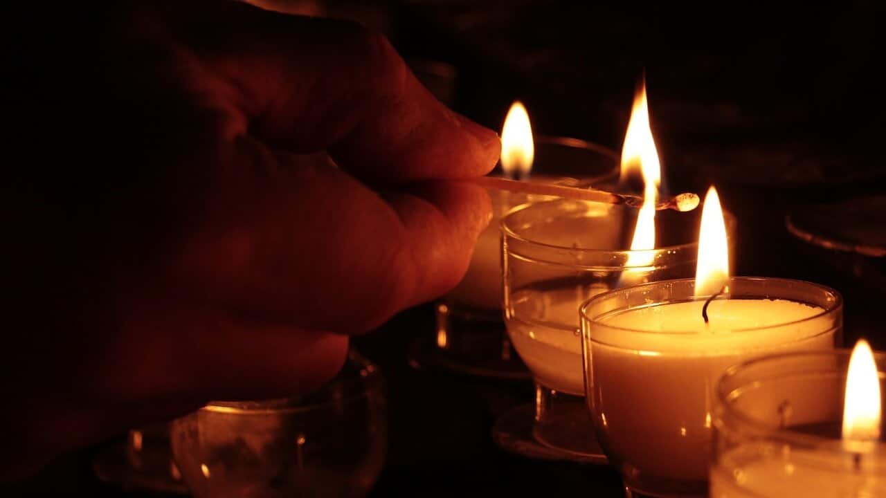 lighting of candles in a church