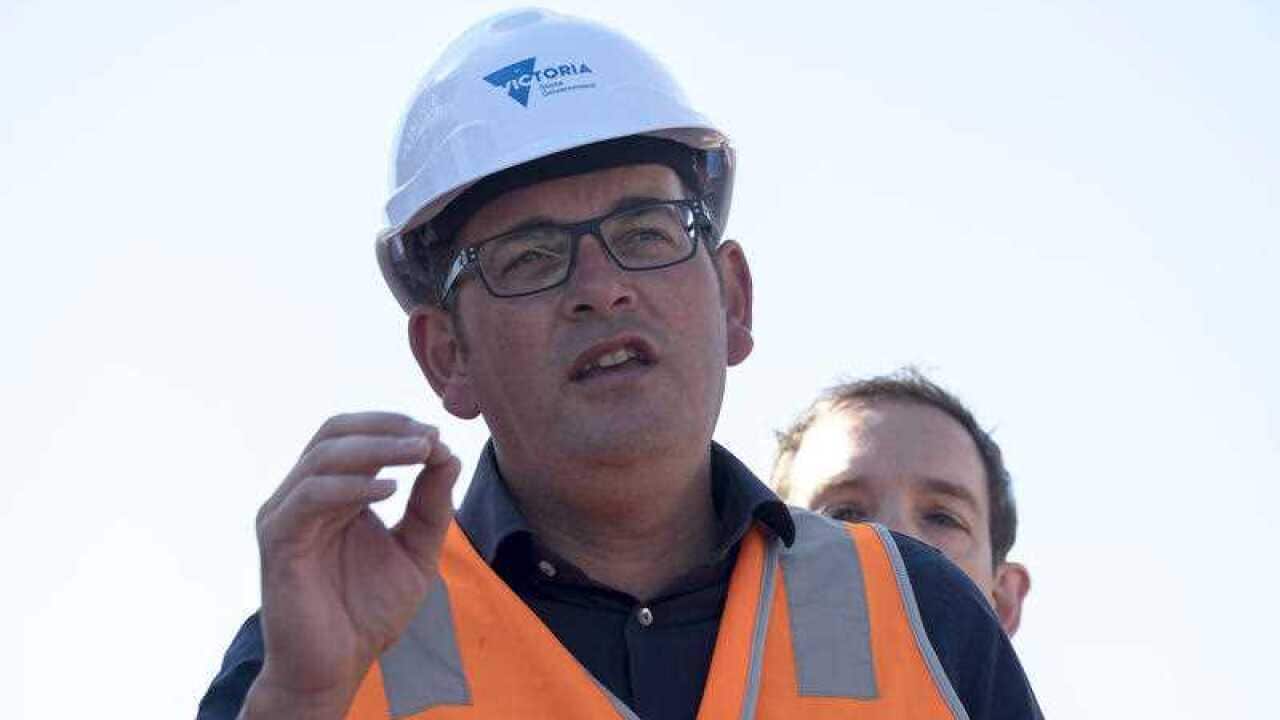 Victorian Premier Daniel Andrews speaks to the media during a visit to a railway level crossing removal site in Murrumbeena, Victoria, Thursday January 11, 2018.