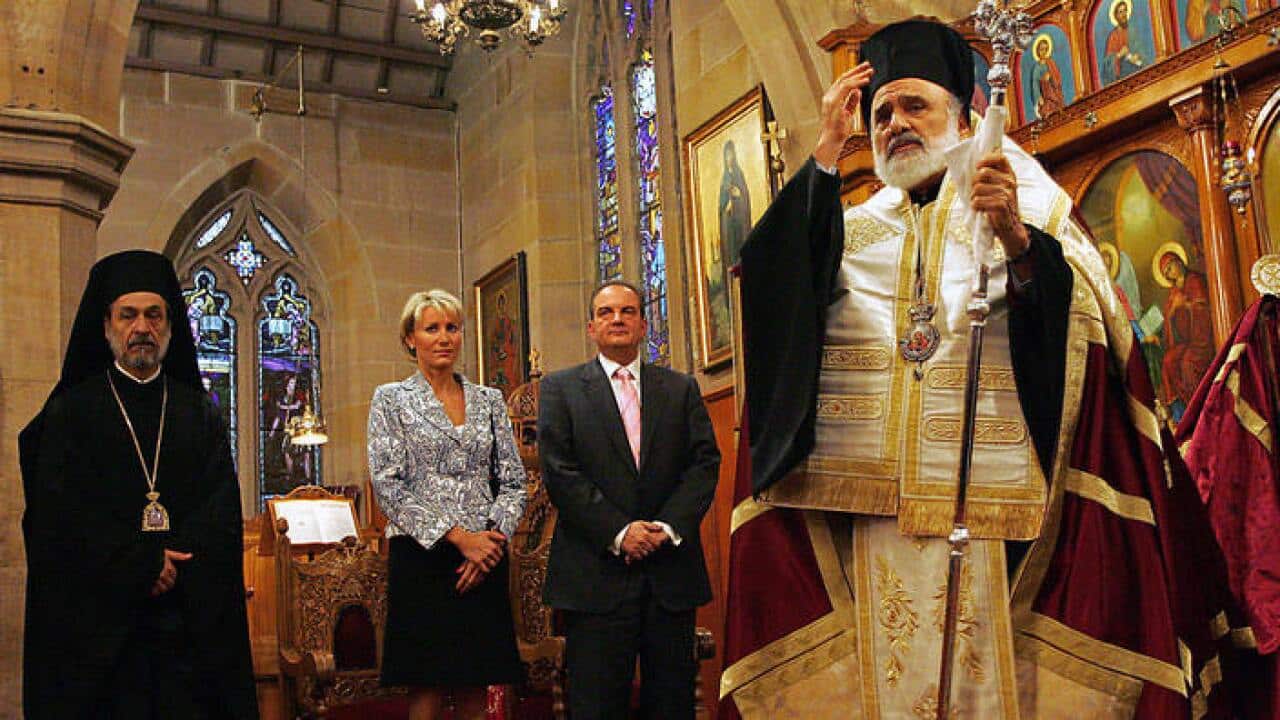 Archbishop Stylianos Harkianakis with Greek PM Kostas Karaminlis and his wife in 2007