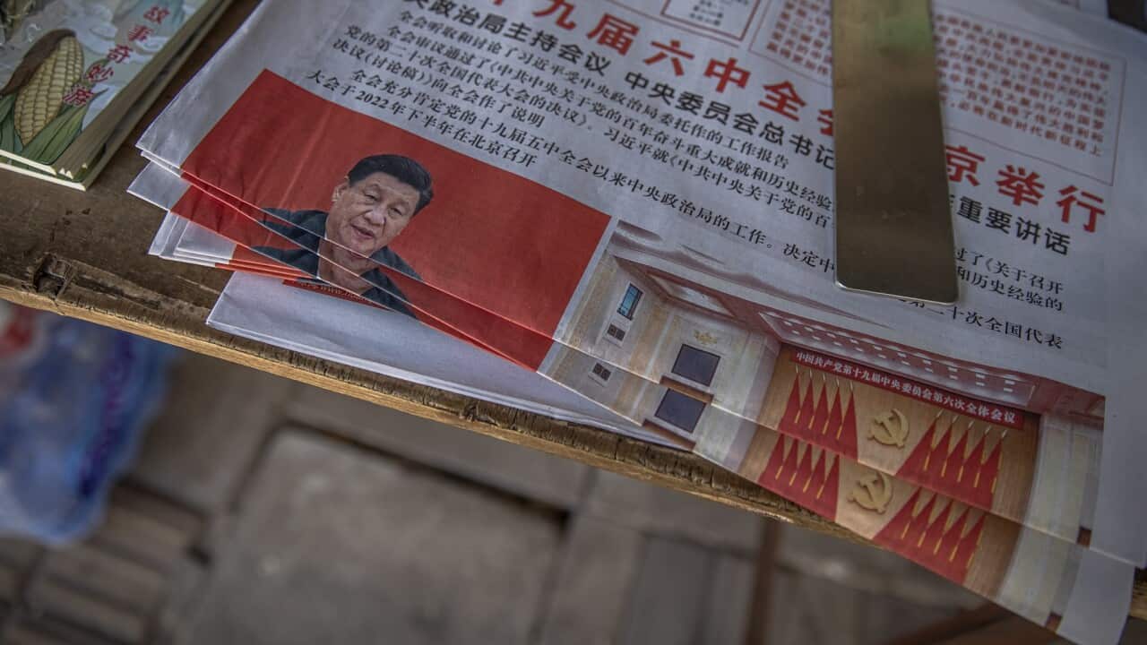 Chinese newspaper headlines after China's Communist Party passed a historic resolution praising President Xi Jinping's role in China's rise in power