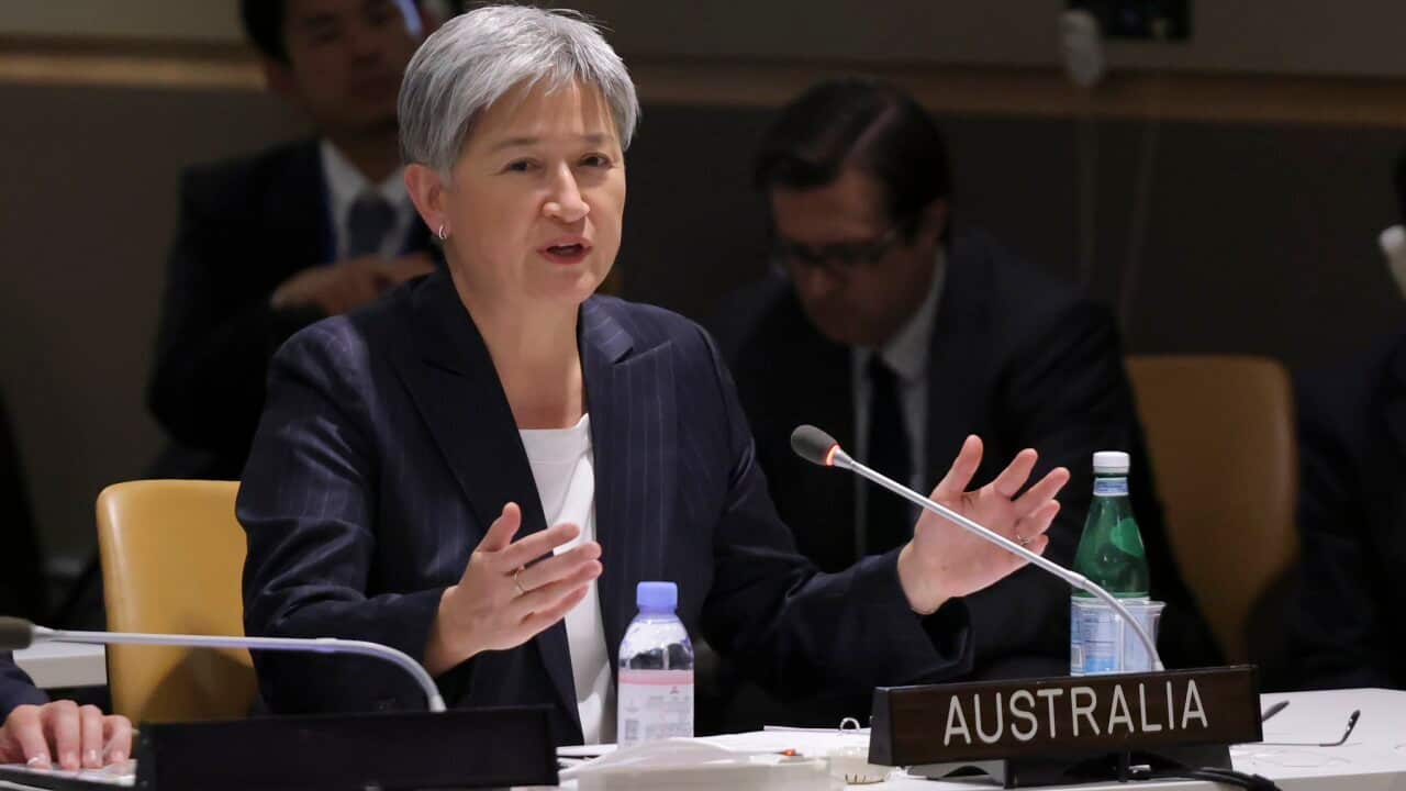 A woman sitting at a desk